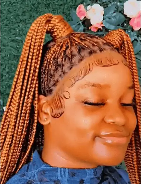 Braided wig installation in progress